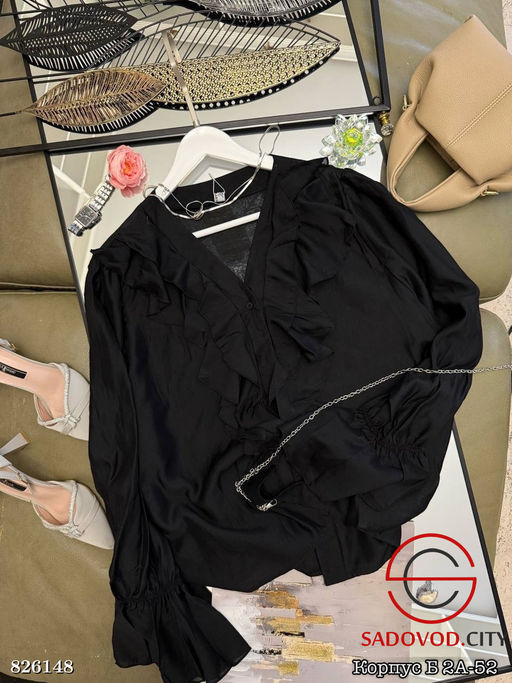 Нарядная блузка с воланами