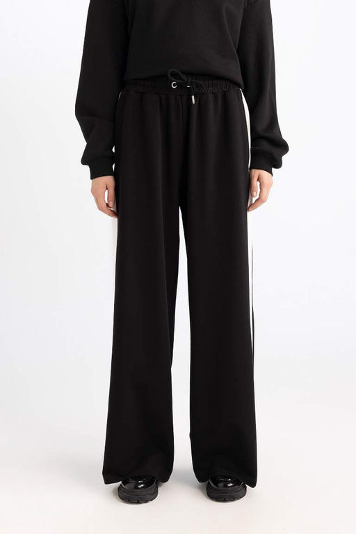 Стильные широкие спортивные штаны с широкими штанинами, эластичным поясом и полосками - Defacto фото 4