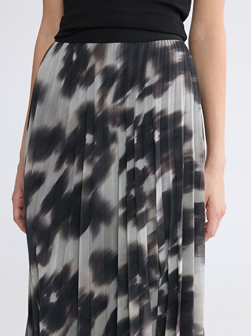 Beli Lastikli ?i?ekli Pileli Etek