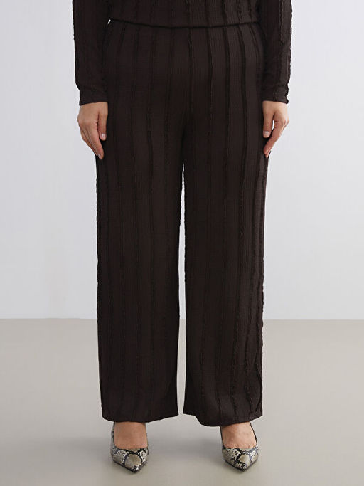 Beli Lastikli Dokulu Kad?n Pantolon