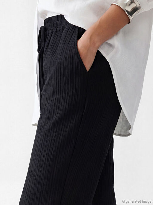 Beli Lastikli Dokulu Kad?n Pantolon