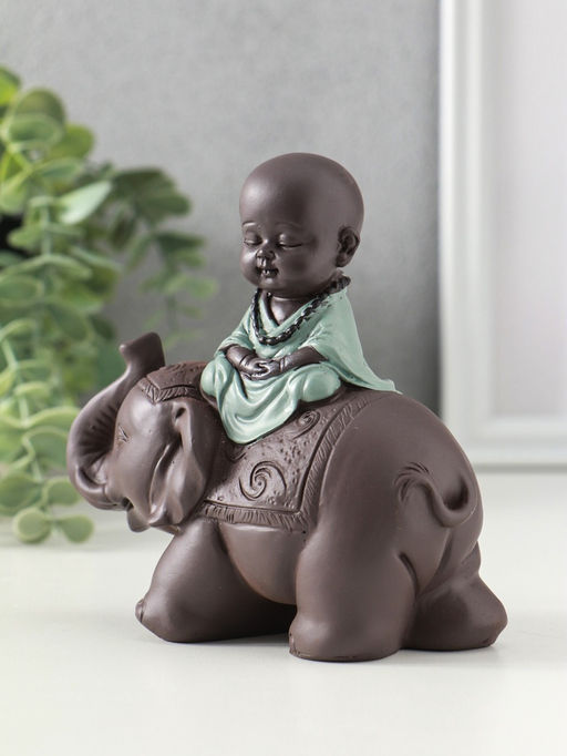 Сувенир полистоун "Маленький будда на слоне" зелёно-коричневый 5,5х12х12 см