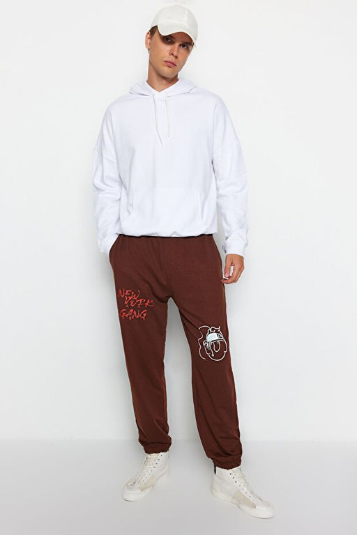 Kahverengi Oversize/Geni_ Kesim Yaz_ Bask_l_ Pa_as_ Lastikli Jogger Bol E_ofman Alt_ TMNSS22EA0119 - Trendyolmilla фото 2