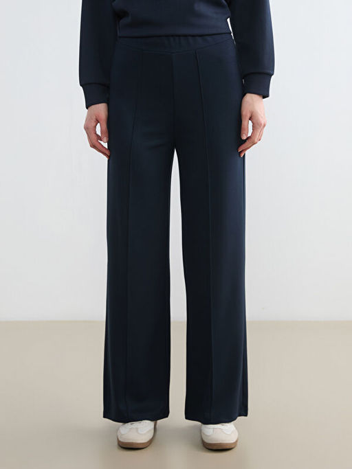 Kad?n Beli Lastikli Geni? Pa?a E?ofman Alt?