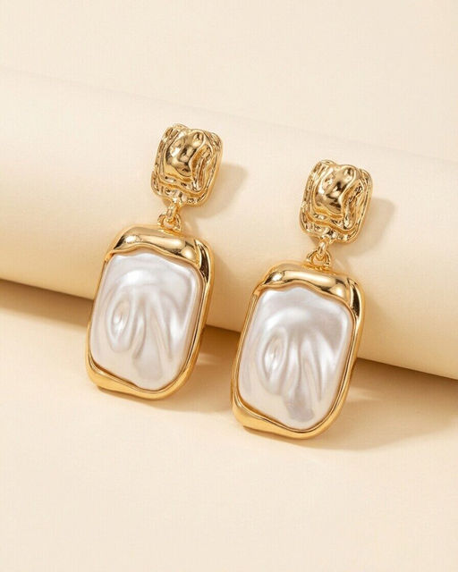 Стильные серьги