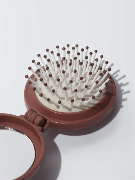 Расчёска массажная «Капибара», складная, с зеркалом, d=6.5 см, коричневая