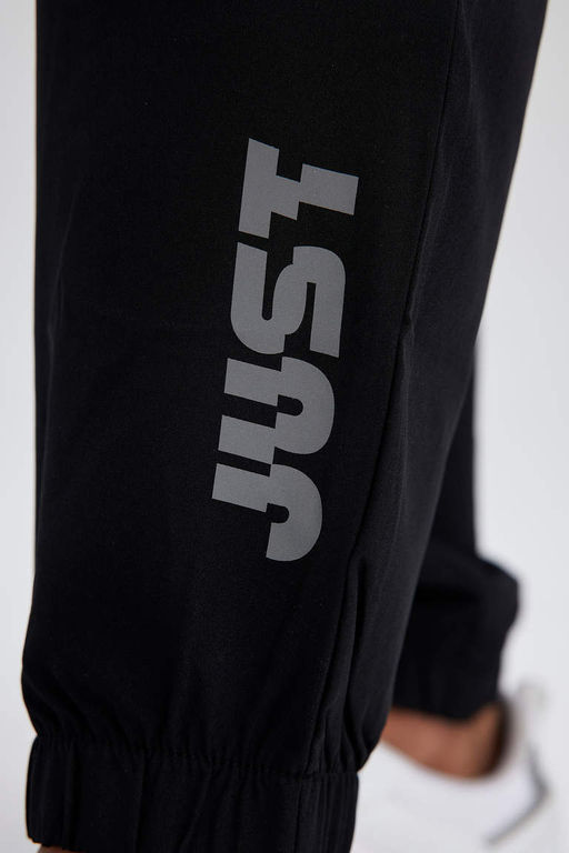 DeFactoFit Облегающие тканые спортивные штаны для бега с двумя карманами  фото 5