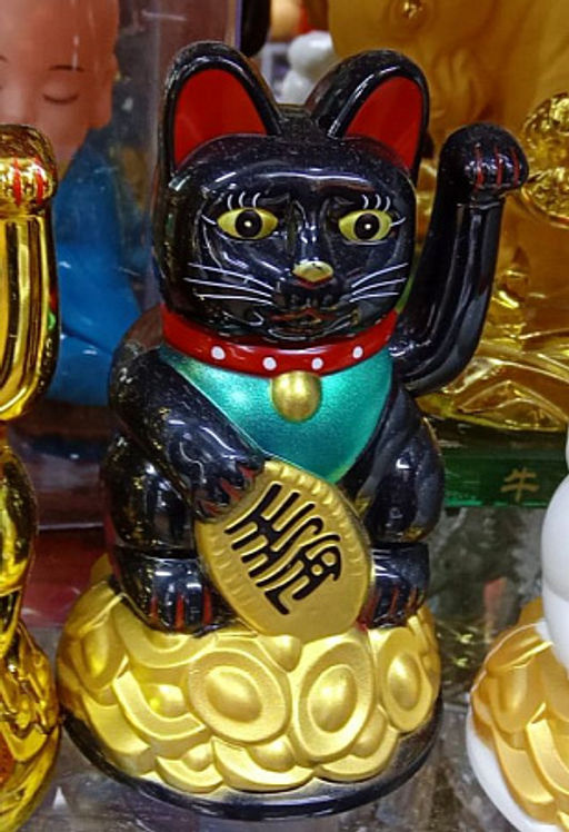 Манеки Неко кошка белая символ финансового благополучия