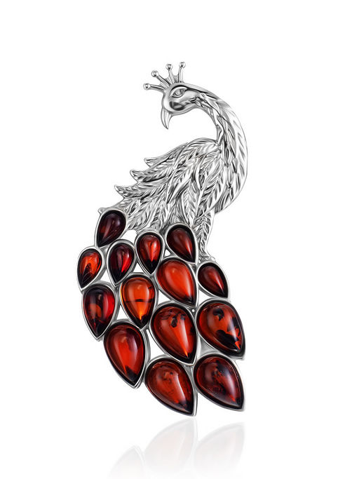 Эффектная брошь с натуральным янтарём вишнёвого цвета Павлин