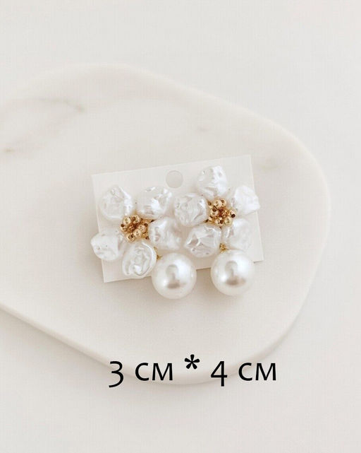 Стильные серьги