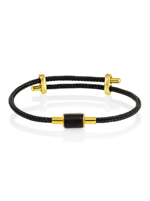 Браслет на плетёном шнурке с матовым янтарным бочонком