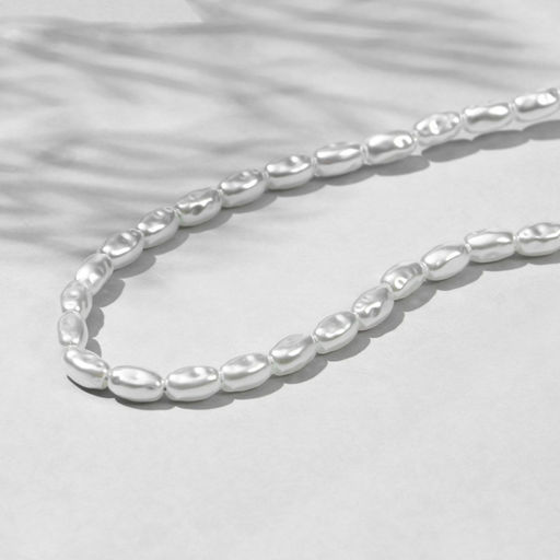 Бусины пластиковые на нити «Жемчуг» рис 0,7×0,5×0,5 см, (набор 150 шт.), цвет белый