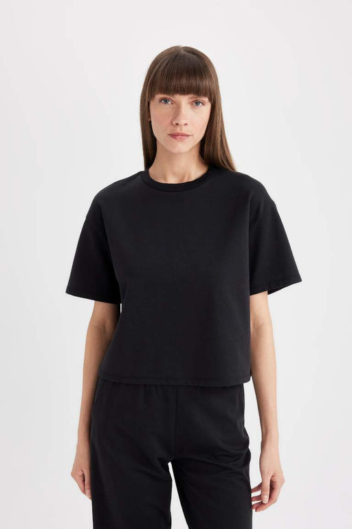 Черная женская базовая футболка с круглым вырезом и короткими рукавами, свободный крой - Defacto фото 3