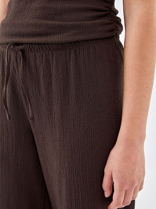 Beli Lastikli Dokulu Kad?n Pantolon