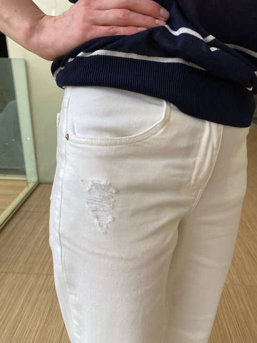 Джинсы клеш с прорезями и необработанным краем из эластичного денима средней плотности - Vilatte фото 11