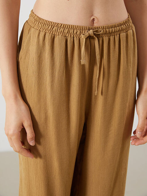 Beli Lastikli Dokulu Kad?n Pantolon