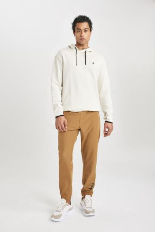DeFactoFit Slim Fit Dar Kesim Cift Cepli Dokuma Sporcu Jogger Esofman Alt?