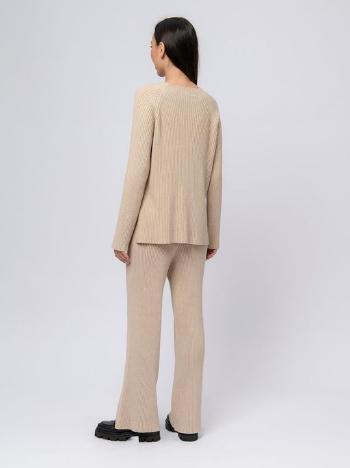 Брюки трикотажные бежевого цвета расклешенные - 1001dress фото 2