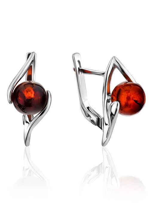 Небольшие оригинальные серьги с коньячным янтарём Альдебаран