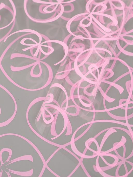 Плёнка для цветов «Бантики», прозрачная/розовая, 0.6×9.3±5% м, 40 мкм, 200 г