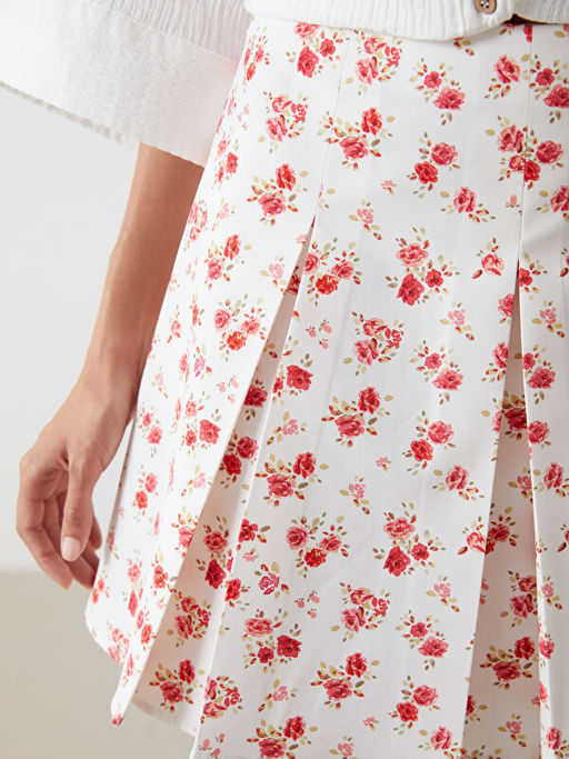 Beli Fermuarl? ?i?ekli Pileli Mini Etek