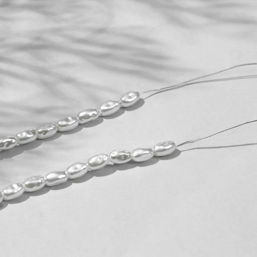 Бусины пластиковые на нити Жемчуг рис 0.7?0.5?0.5 см, (набор 150 шт.), белые