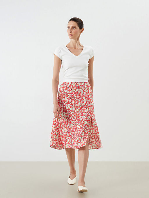 Beli Lastikli ?i?ekli Y?rtma?l? Etek