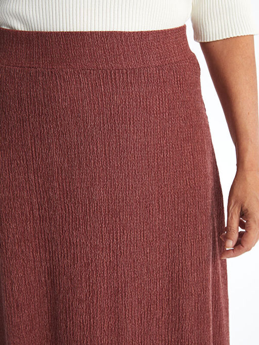 Beli Lastikli Dokulu Kad?n Etek