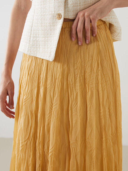 Beli Lastikli Pileli Etek