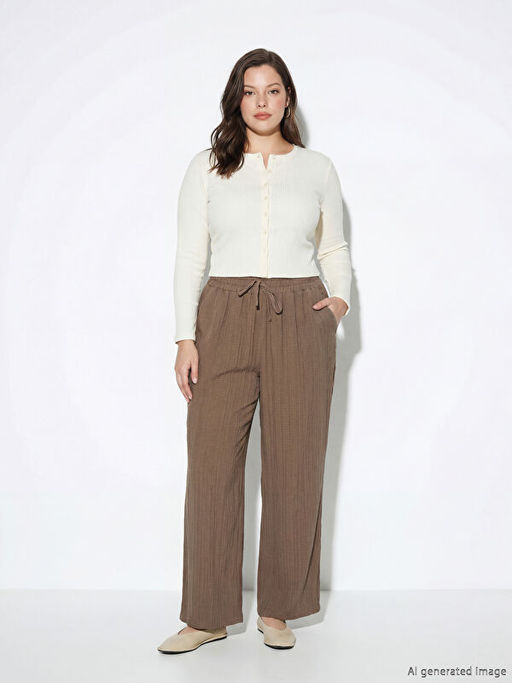 Beli Lastikli Dokulu Kad?n Pantolon