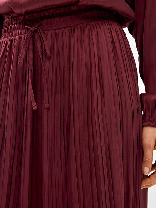 Beli Lastikli Kad?n Etek