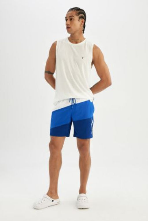 DeFactoFit Regular Fit Bask?l? Esnek Dokulu K?sa Boy Deniz Sortu