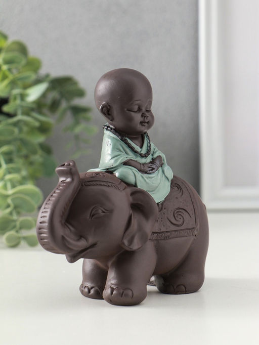 Сувенир полистоун "Маленький будда на слоне" зелёно-коричневый 5,5х12х12 см