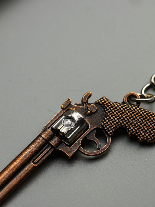 Цена за 12 шт. Брелок металл "Револьвер" крутится барабан МИКС 5,8х2,8х0,9 см