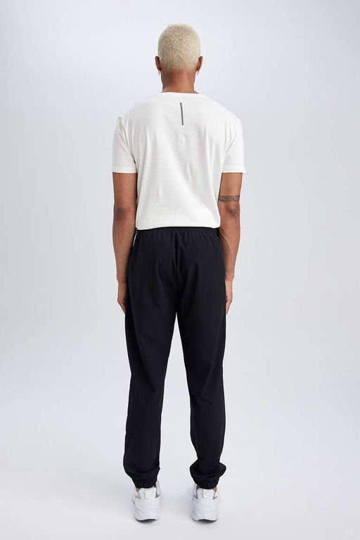 DeFactoFit Облегающие тканые спортивные штаны для бега с двумя карманами  фото 6