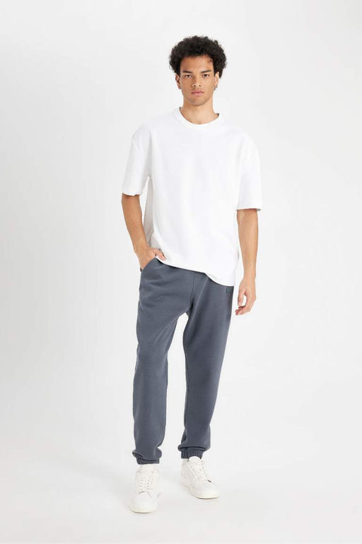 Мужские спортивные штаны обычного кроя антрацитового цвета с карманами и эластичными штанинами - Defacto фото 2